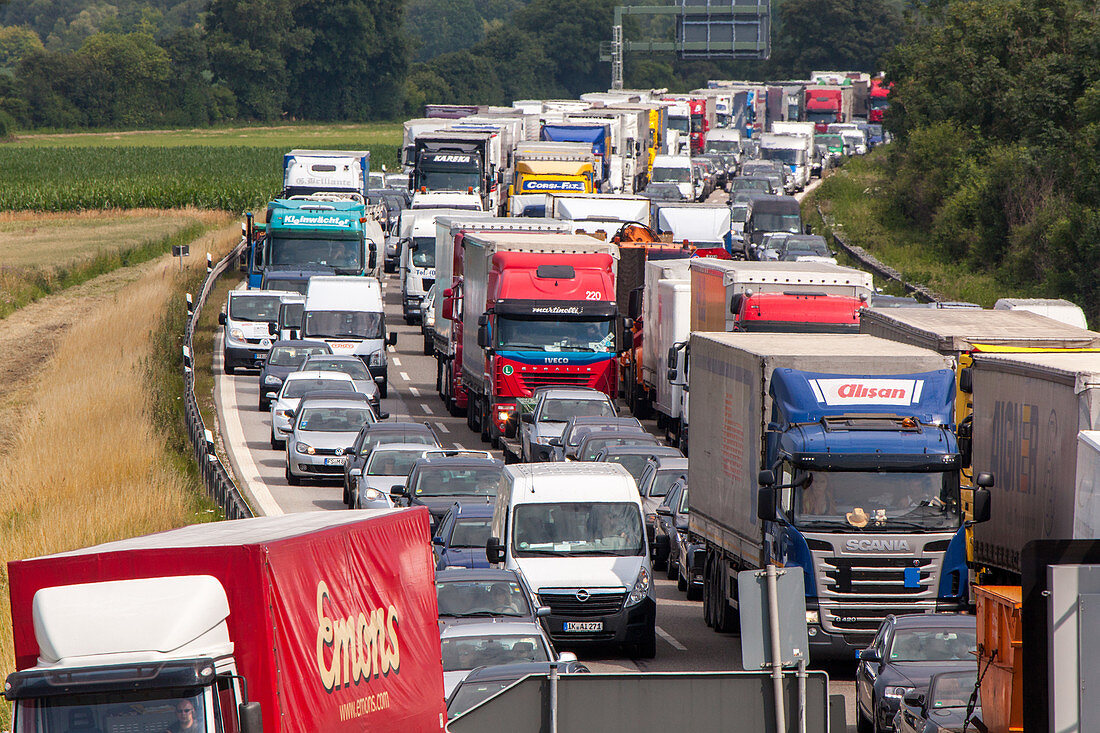 71123313 german autobahn traffic jam congestion a 99 cars trucks stopped halt motorway highway freeway speed speed