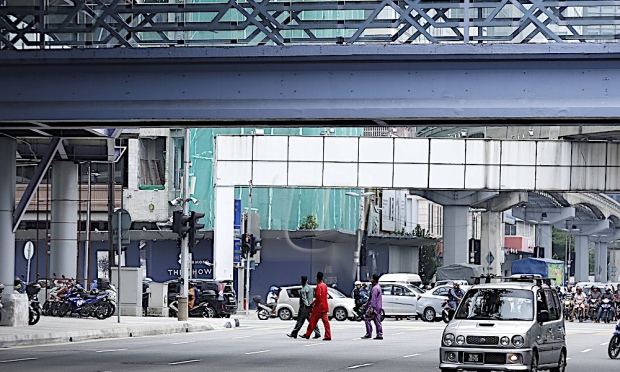 kuala lumpur bandar pekerja tertekan