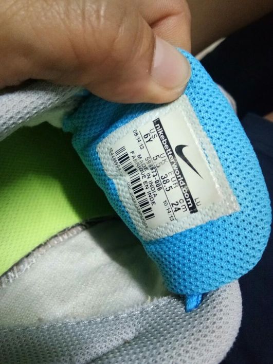 label kasut nike