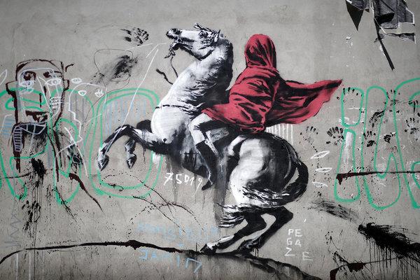 lukisan banksy di dinding