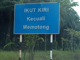 papan tanda memotong