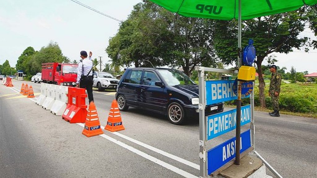 pemeriksaan polis perintah kawalan pergerakan